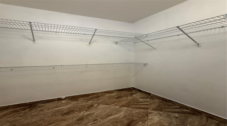 Primary Bedroom Walk-in Closet #1
