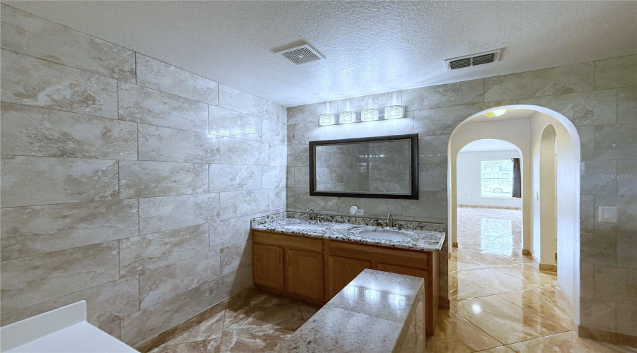 Primary Bathroom suite Photo #1