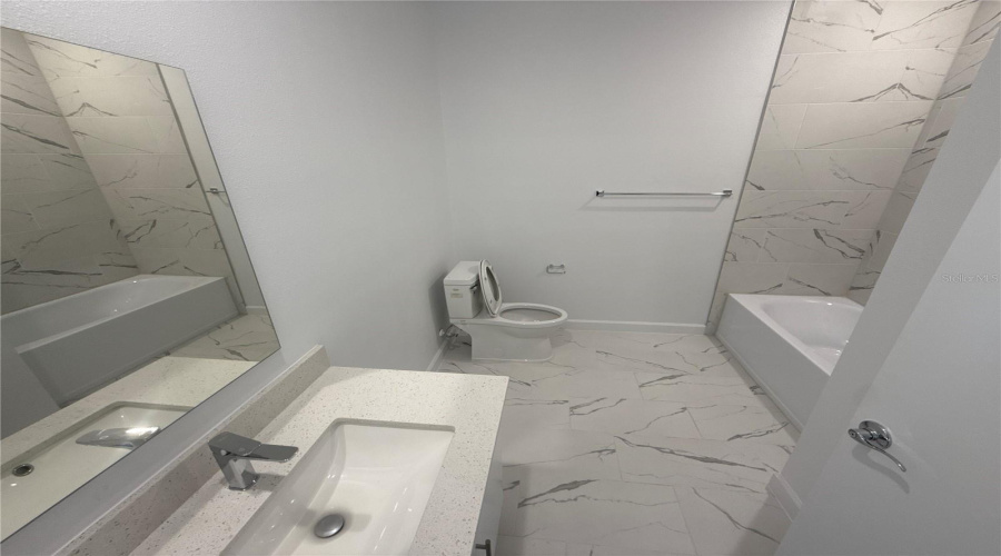 2nd floor bathroom with laundry closet