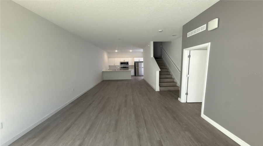 VIEW FROM LIVING ROOM TOWARDS KITCHEN