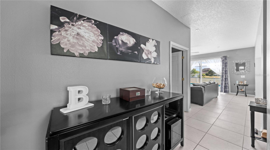 Hall way to family room and kitchen