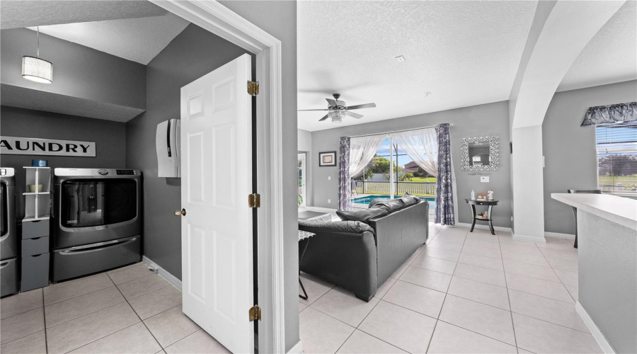 Laundry room across from dining room