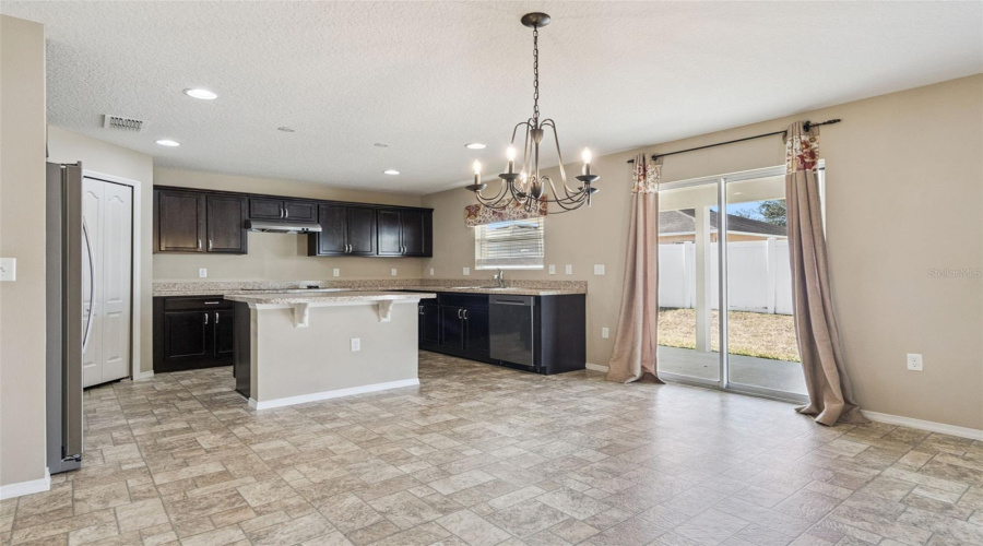 Open Floor Plan with in kitchen dining