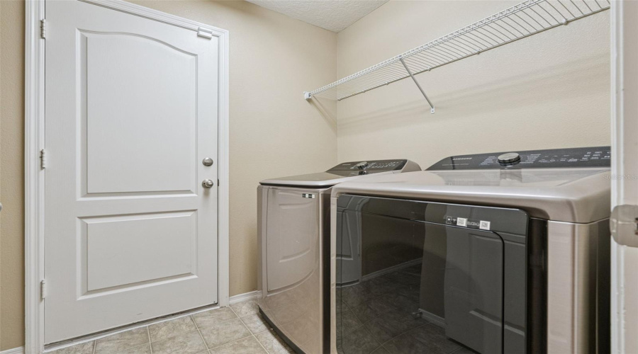 Inside Laundry Room - washer and dryer included with MORE storage