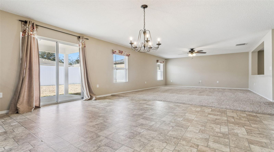 Dining Room and Living Room looking into backyard