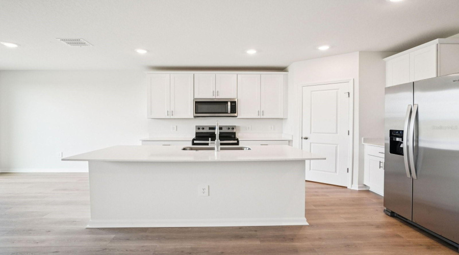 Photo is not of the actual home, but is an inspirational photo of builder’s model home and may depict options, furnishings, and/or decorator features that are not included