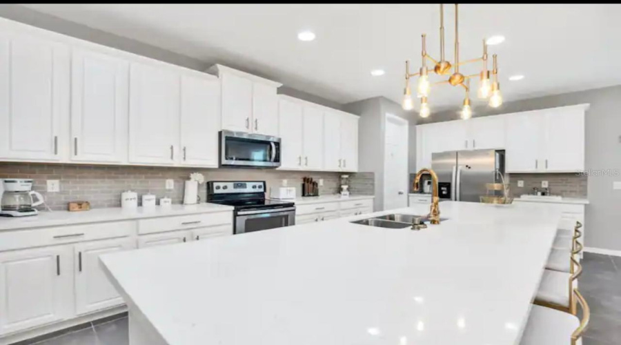 KISSIMMEE, Florida 34747, 6 Bedrooms Bedrooms, ,5 BathroomsBathrooms,Residential,For Sale,SAWYER PALM,0,MFRO6381814