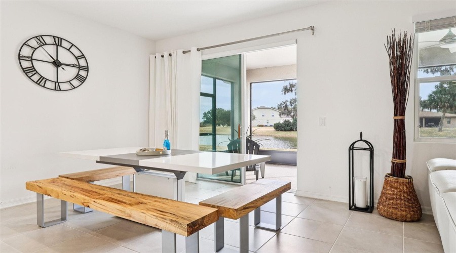 Enjoy your seating area with views of the water, next to the kitchen and the TV