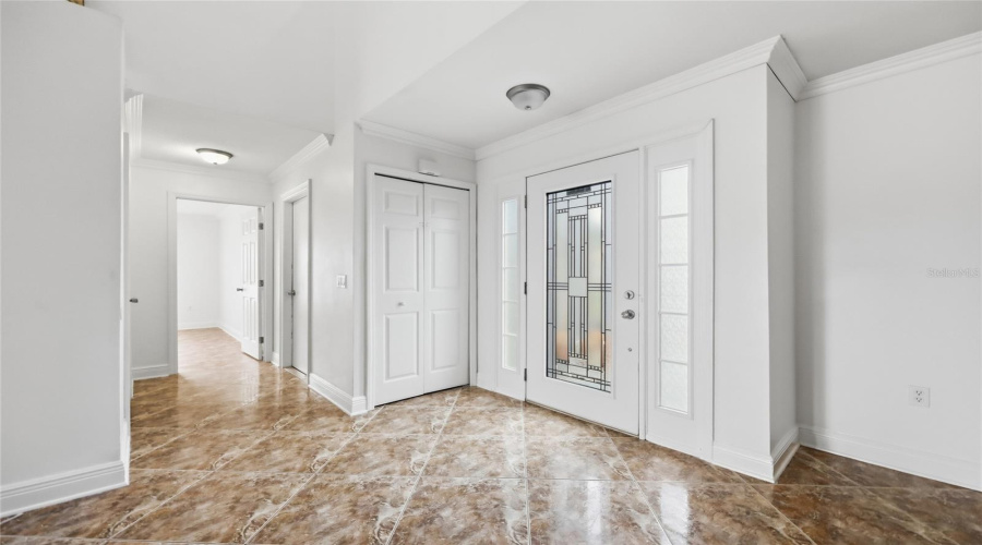 Entrance- Downstairs guest BEDROOM left hall with half bathroom