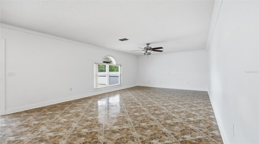 Great room/ Family room- Crown molding- double height base boards