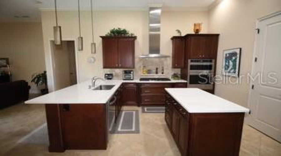 Kitchen with newly installed quartz countertops