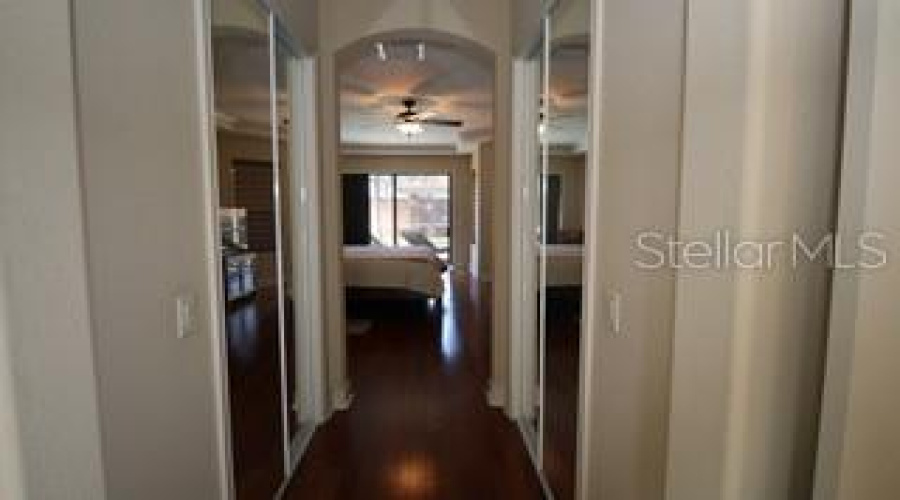 Primary Bedroom hallway with closets on both sides