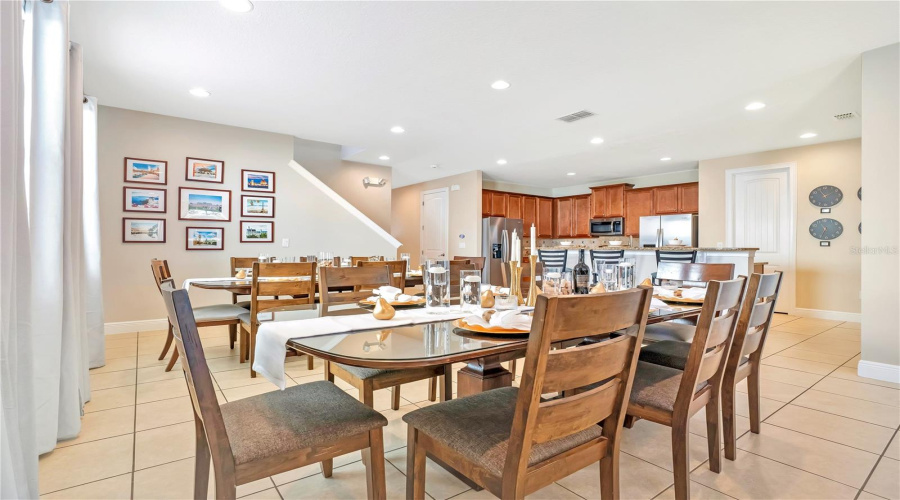 Large dining space designed to comfortably accommodate group meals and gatherings.