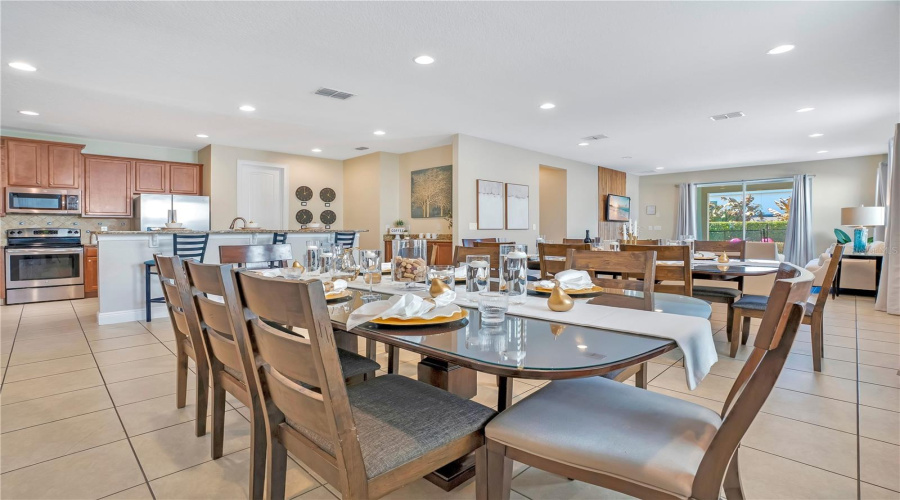 Bright, open dining area with direct access to the main living space.