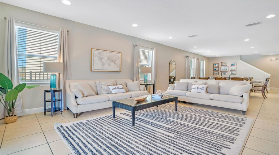 Generous living area with abundant seating and natural light
