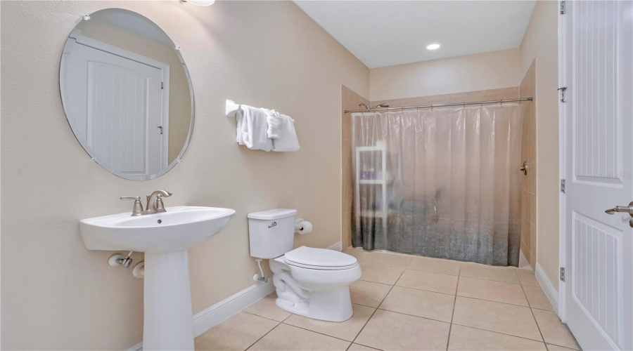 Well-appointed full bath offering comfort and privacy for guests