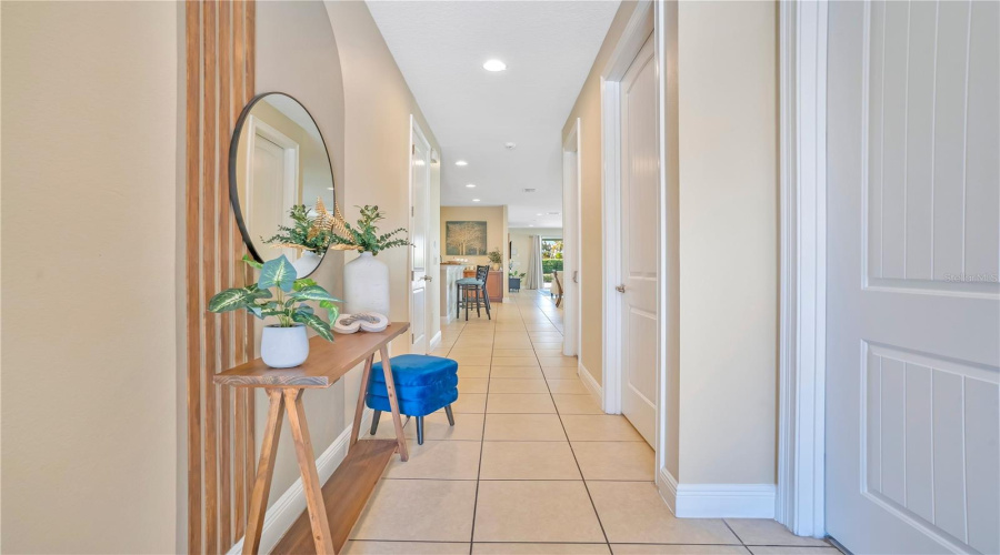 Light filled inviting Foyer Welcomes Guests and Friends alike!