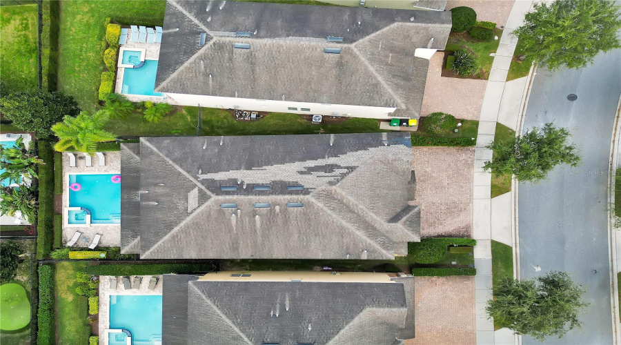 Bird’s-eye view highlighting the property’s generous lot and well-maintained surroundings