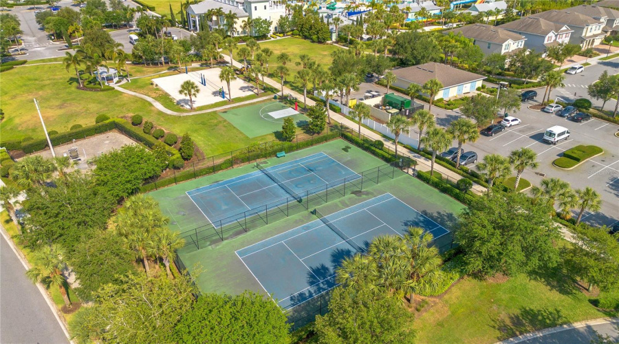 Community tennis courts and recreational facilities enhancing guest appeal and rental value