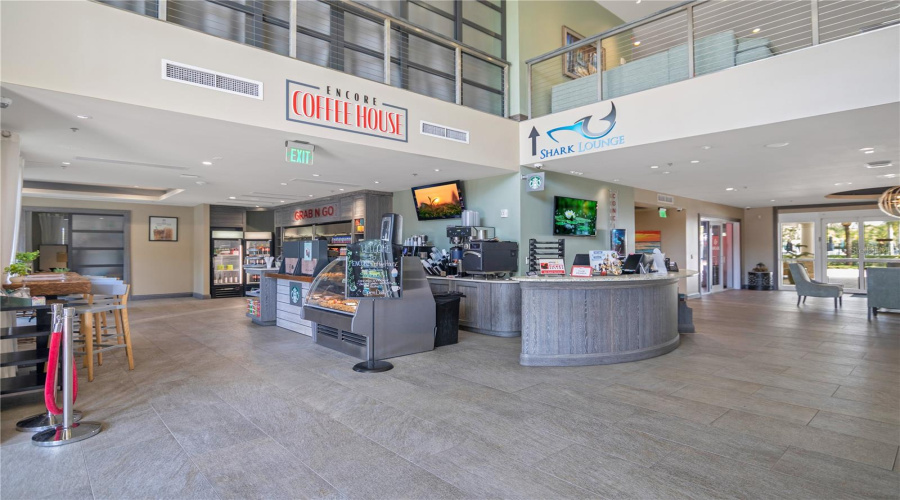Encore Resort clubhouse interior with concierge services, dining, and guest amenities