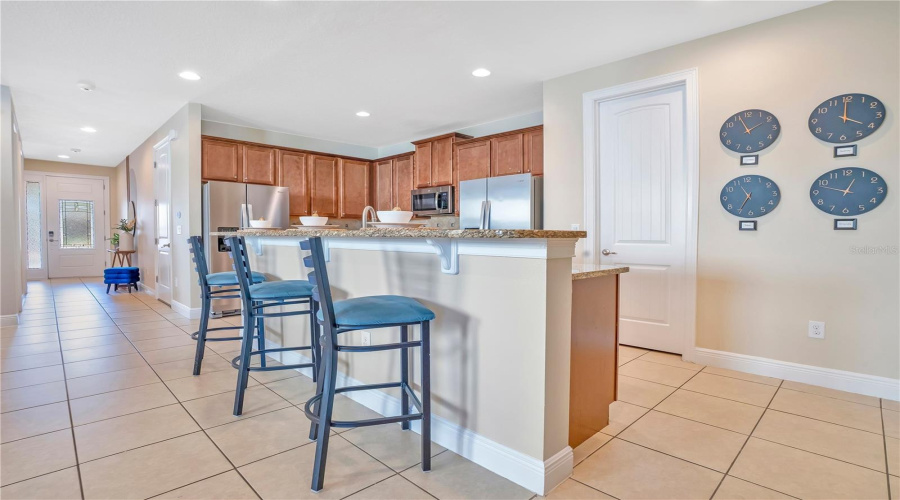 Open-concept living space with seamless flow to dining and kitchen—ideal for entertaining larger groups.