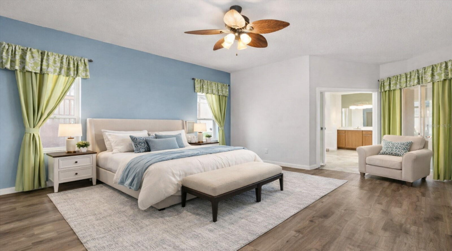 Virtually Stagged Primary Bedroom with entrance to pool