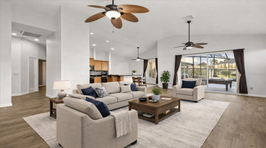 Virtually Stagged Large living area with lots of natural lighting