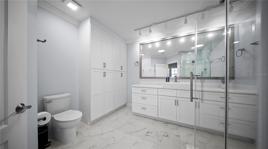Fully Renovated Primary Bathroom w/ Porcelain Tile and Linen Closet