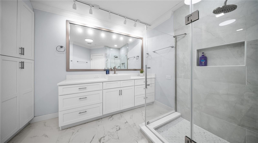 Fully Renovated Primary Bathroom w/ Porcelain Tile and Linen Closet