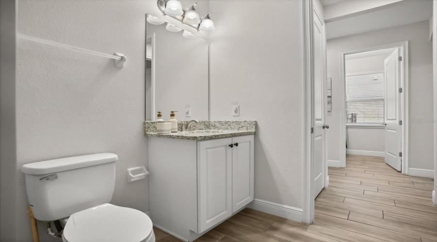 Additional bathroom featuring clean design and functional layout.