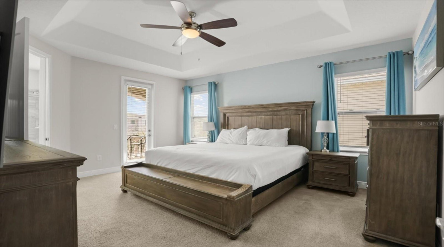 Second bedroom with spacious layout and balcony.