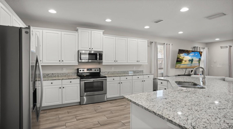 Bright and open kitchen and dining space with plenty of room