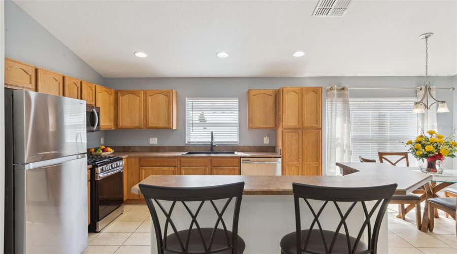 Open kitchen with room