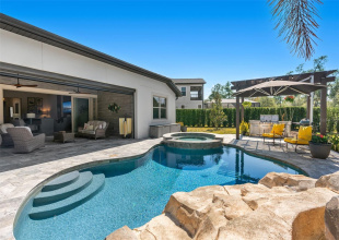 Backyard Oasis with pool, spa, pergola, and summer kitchen