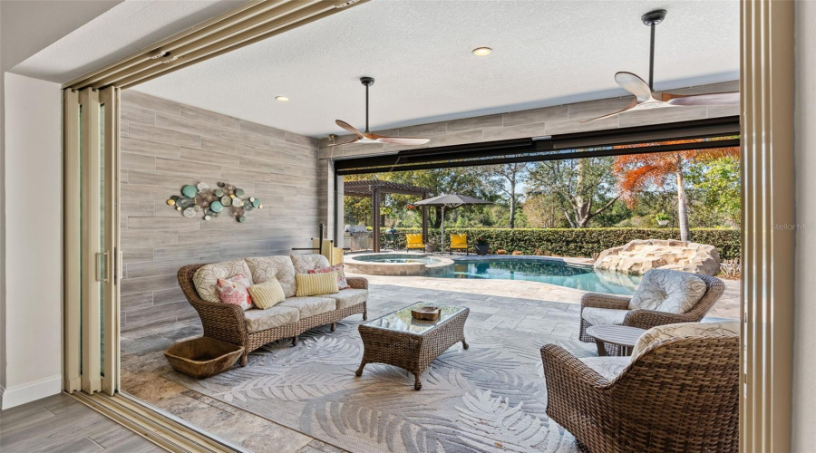 Fully retractable glass sliding doors for indoor/ outdoor living