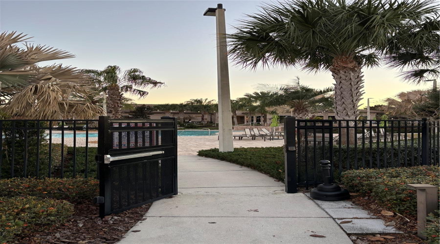 Gated back entrance for residents only opened by key card