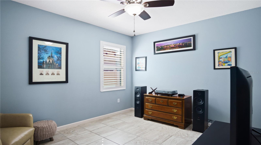 Bedroom 2 located in the center of the home