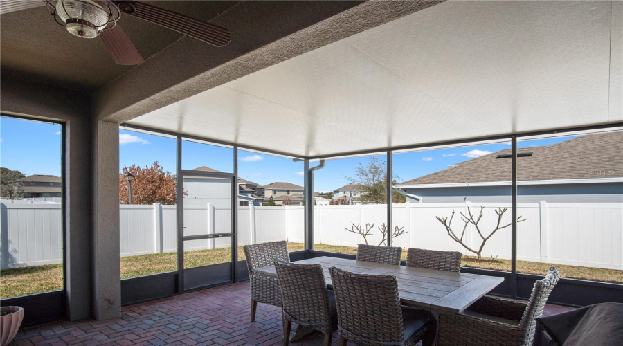 Large screened in and covered paver patio