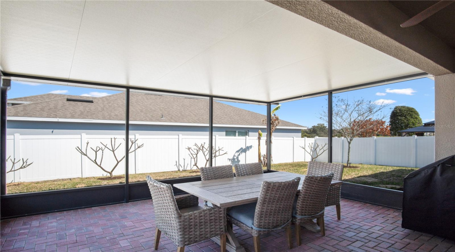 Large screened in and covered paver patio