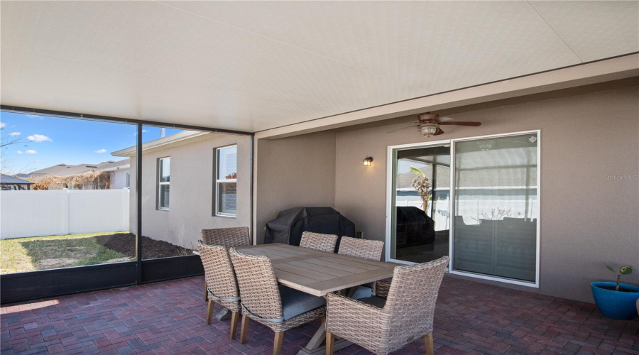 Large screened in and covered paver patio