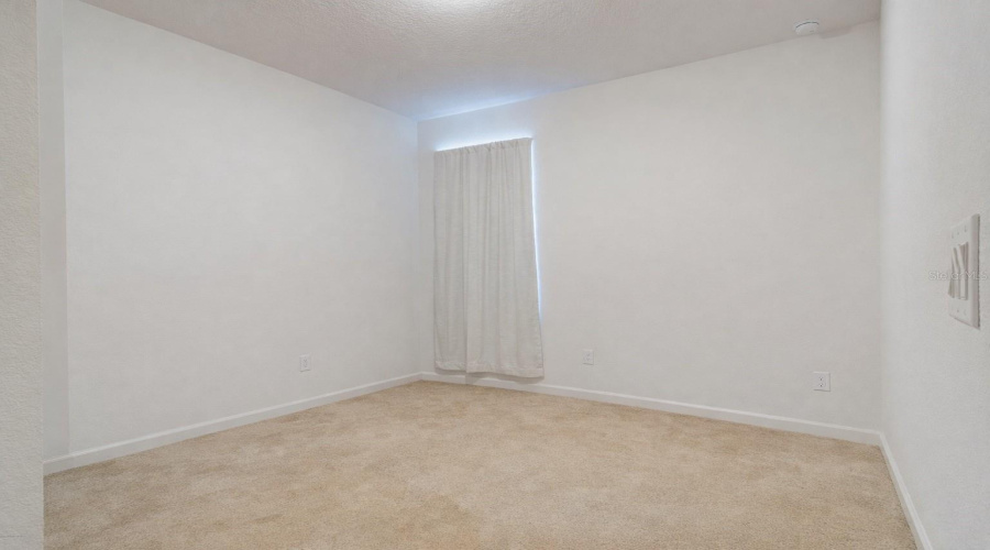 This photo has been virtually edited to remove items from the room.