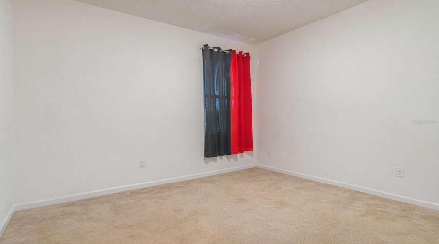 This photo has been virtually edited to remove items from the room.