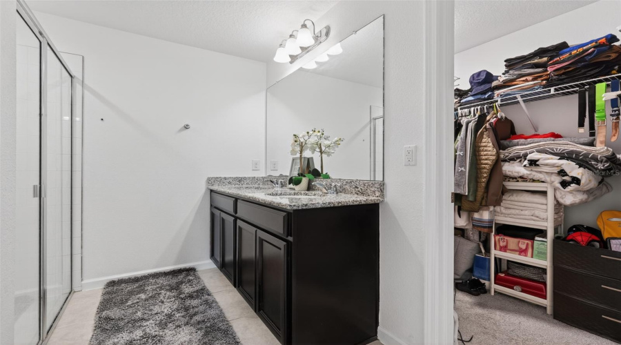 Primary Bathroom with Walk-In Shower and Dual Sinks