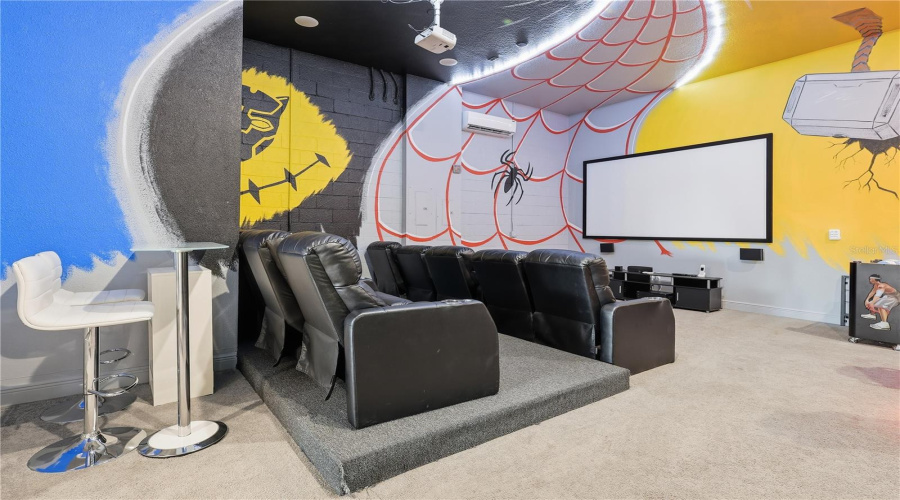 Garage Converted into Themed Game & Theater Room