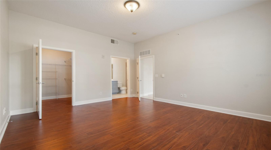 PRIMARY CLOSET AND BATHROOM