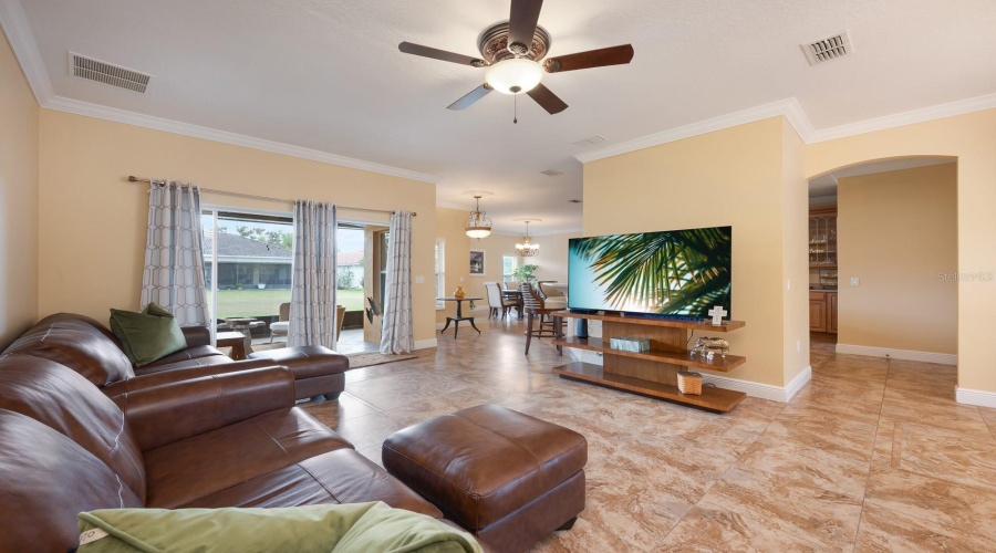 Flowing floor plan has formal and family spaces.