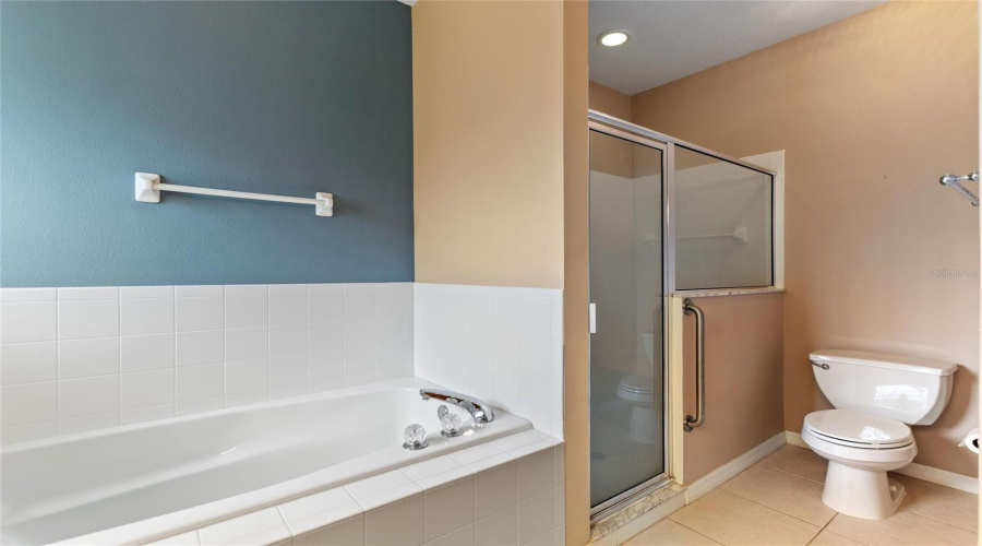 Private bath from primary en suite bedroom