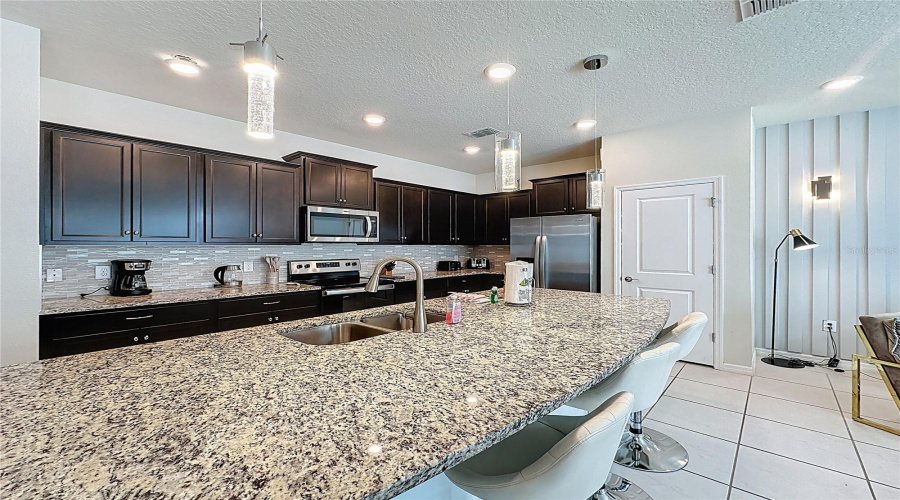 DAVENPORT, Florida 33897, 5 Bedrooms Bedrooms, ,4 BathroomsBathrooms,Residential,For Sale,LAVA TREE,0,MFRS5144197