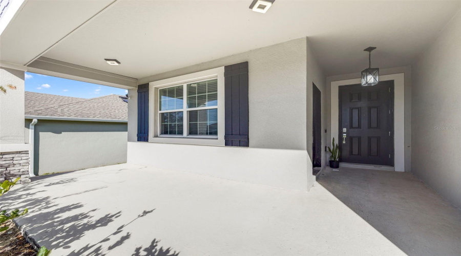 Covered front porch/Entrance to the 'Next Gen' 1bd/1ba apartment.