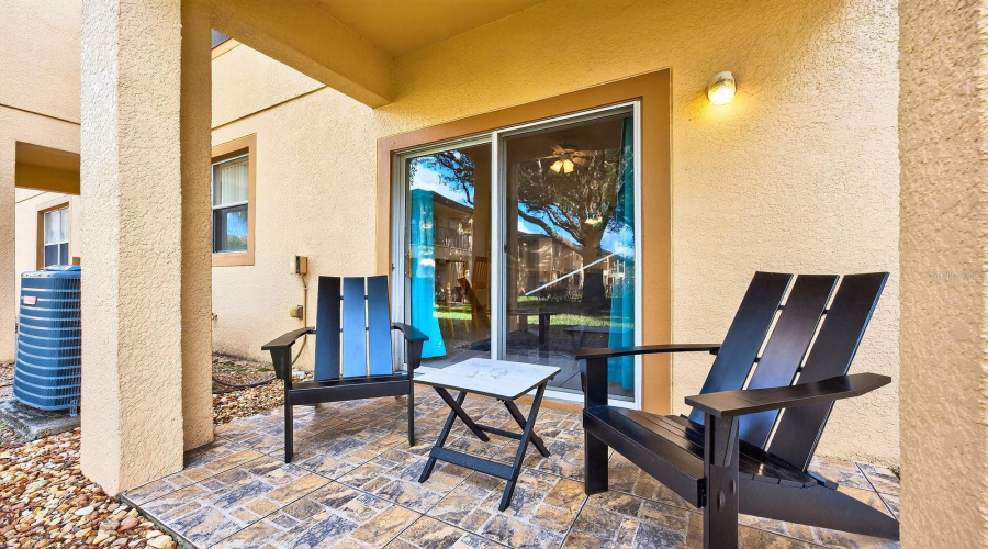 Relax and unwind after a long day at the parks on your covered lanai.